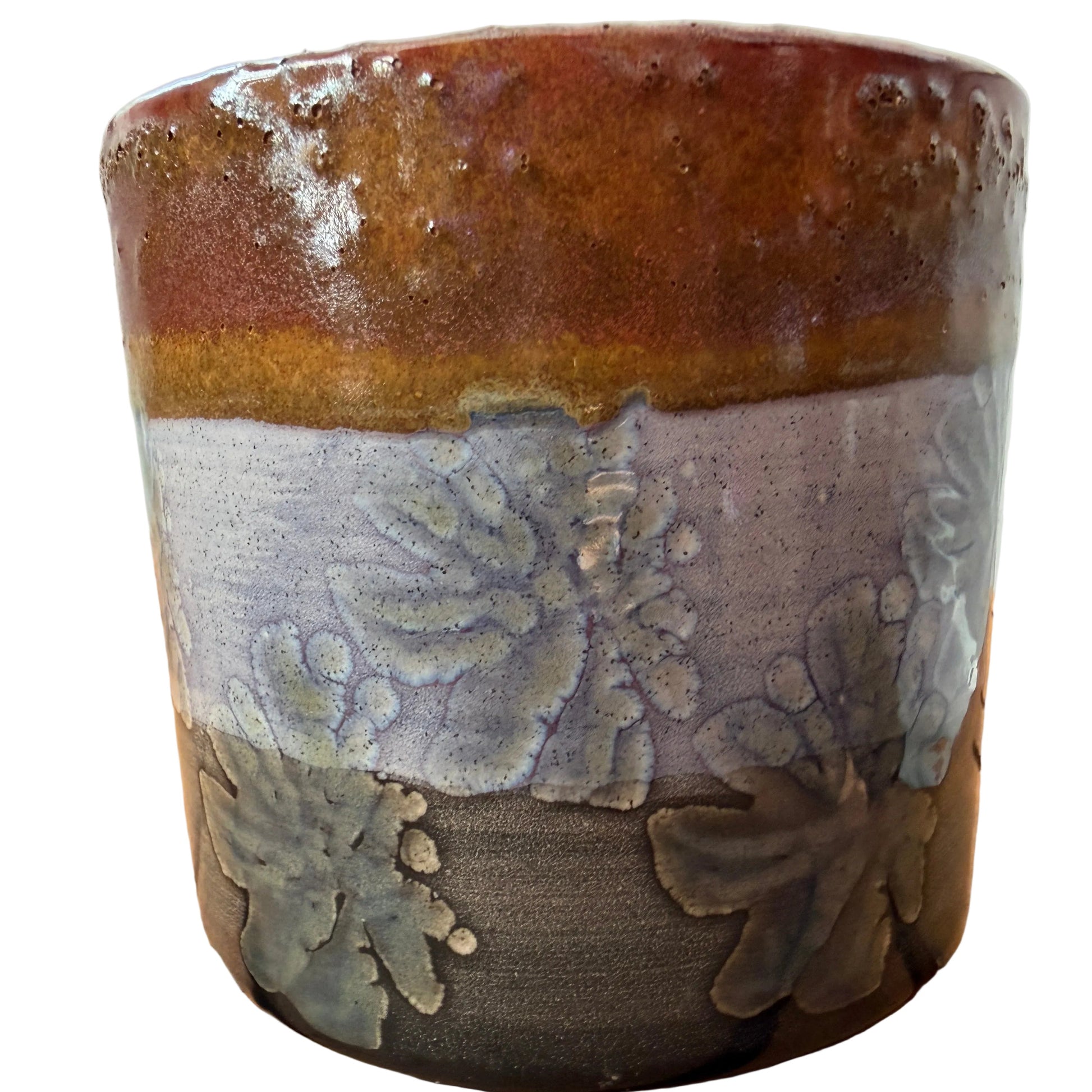 Ceramic cache pot with textured flower surface blue bown